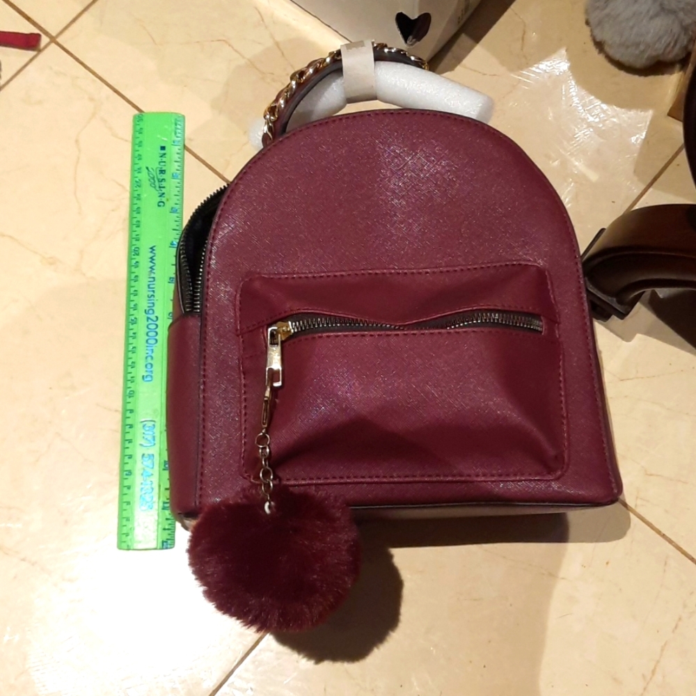 GORGEOUSLY Sassy Burgundy backpack 🎒 😍 with faux fur pompom